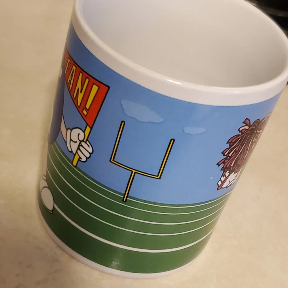 M&M coffee mug by Galerie cheerleader football